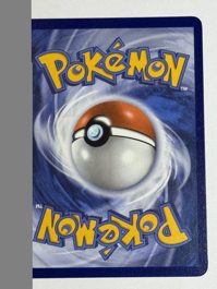 Team Rocket's Meowth (arka)